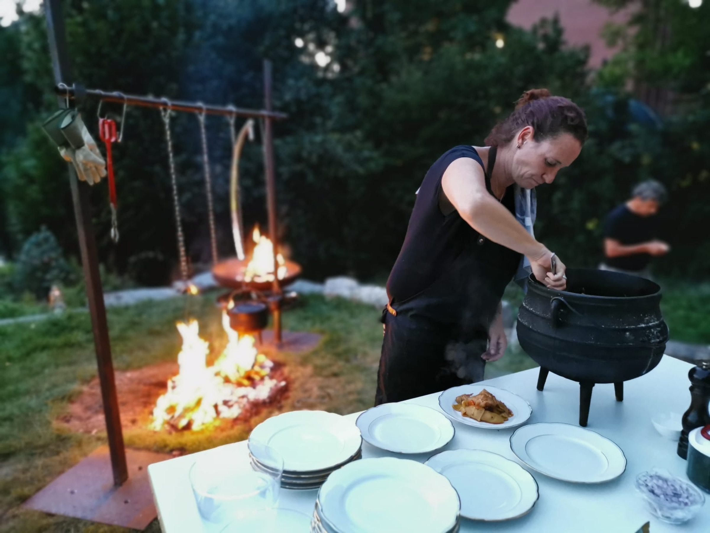 Trixi Rüegg preparing food outdoors
