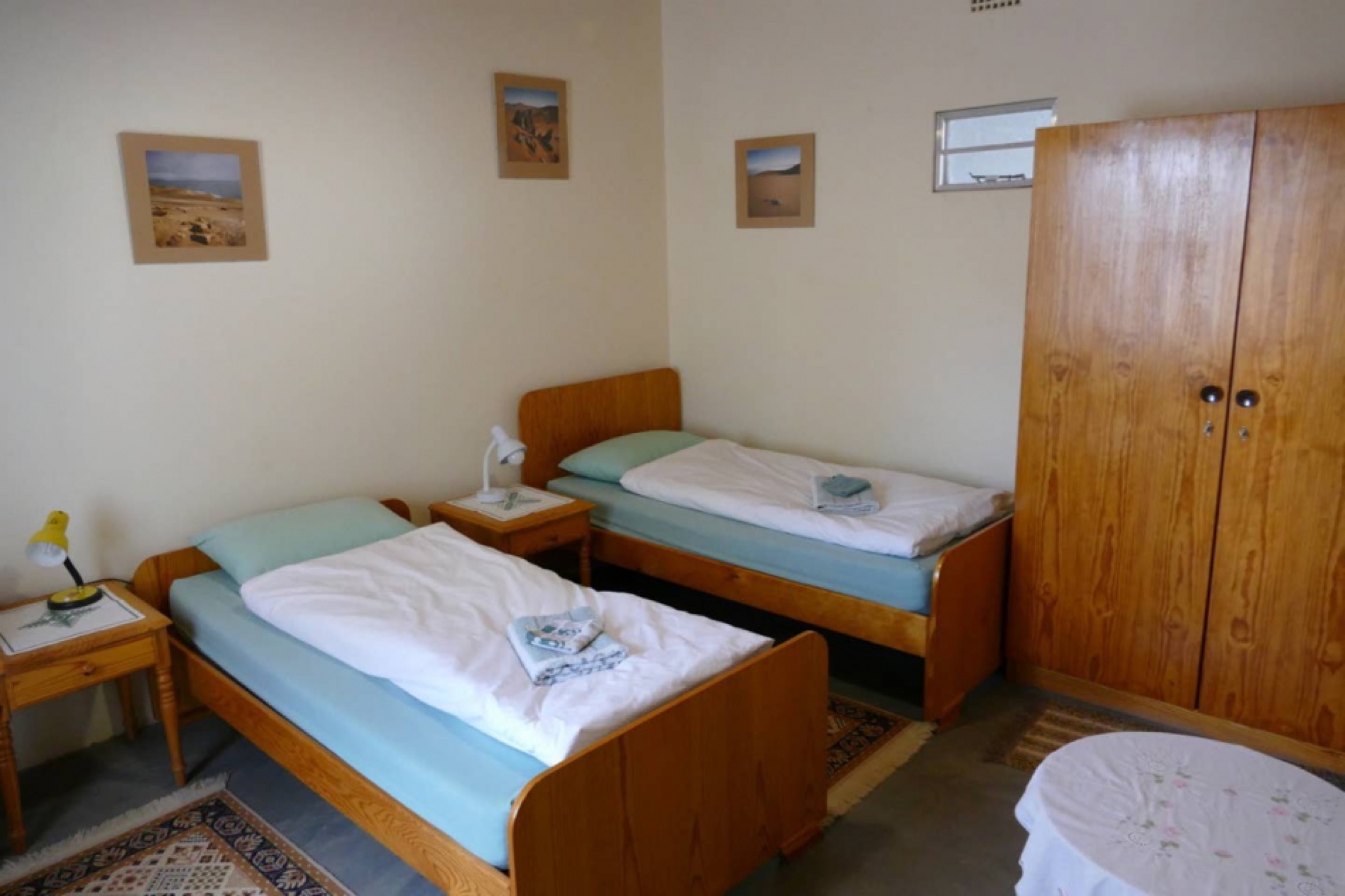 Second twin room with two single beds