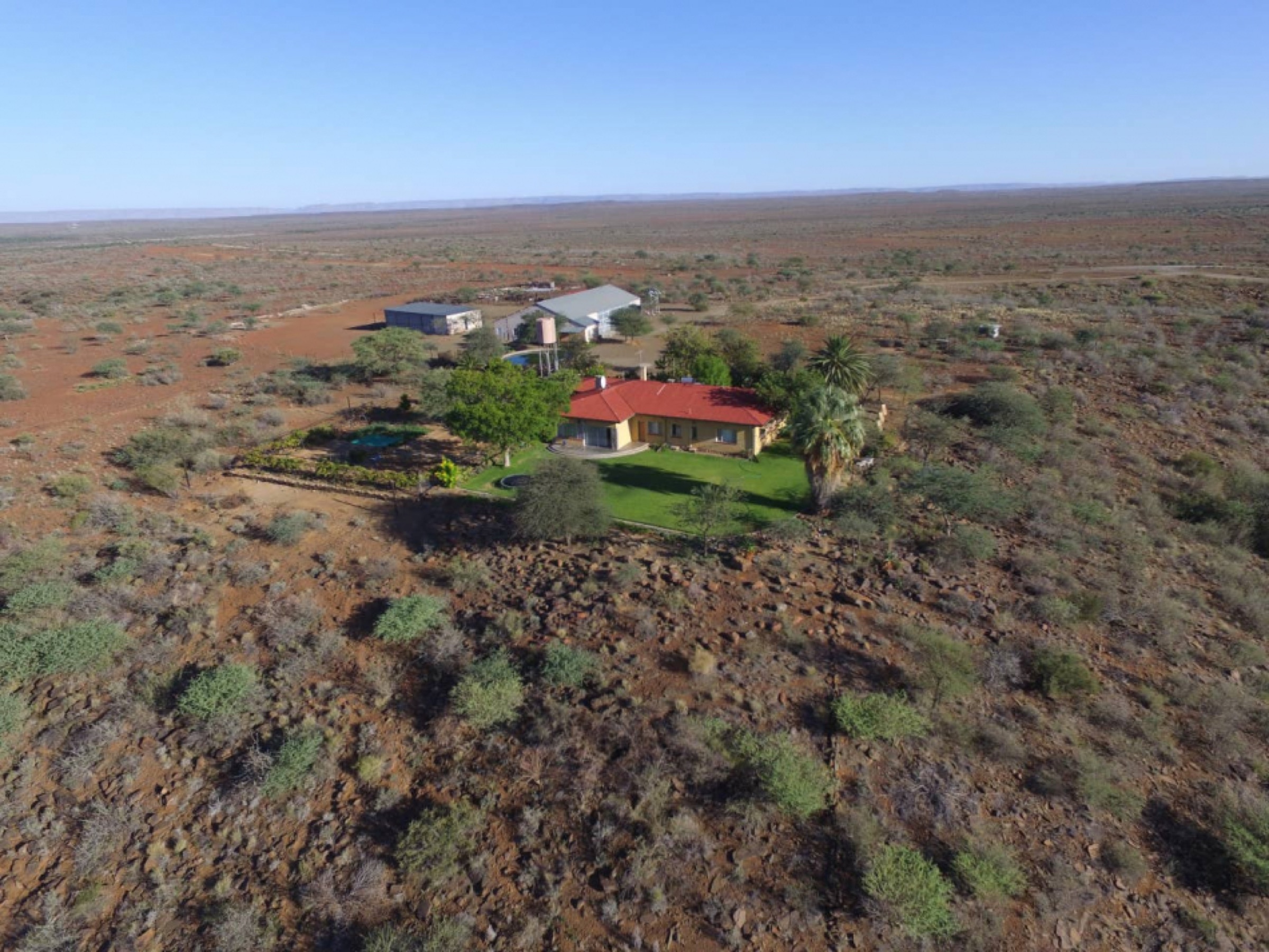 Aerial view of Gamis Farm in the open landscape